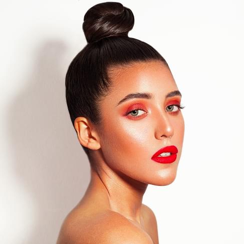 Fashion portrait of a woman with bright makeup